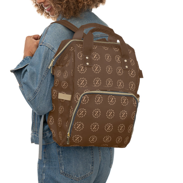 Zenglitz Multifunctional Diaper Backpack - Brown Zenglitz Print Diaper Backpack - Brown Unisex Z Print Backpack - Multifunctional Diaper Backpack - Brown All Over Print Backpack - Zenglitz Print - Brown Backpack