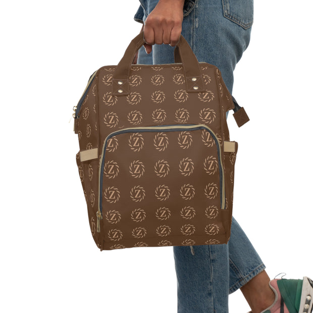 Zenglitz Multifunctional Diaper Backpack - Brown Zenglitz Print Diaper Backpack - Brown Unisex Z Print Backpack - Multifunctional Diaper Backpack - Brown All Over Print Backpack - Zenglitz Print - Brown Backpack